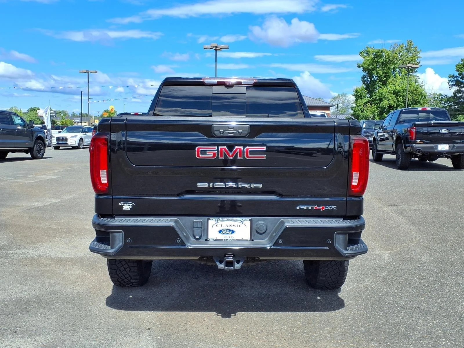 Used 2023 Onyx Black GMC AT4X image 10