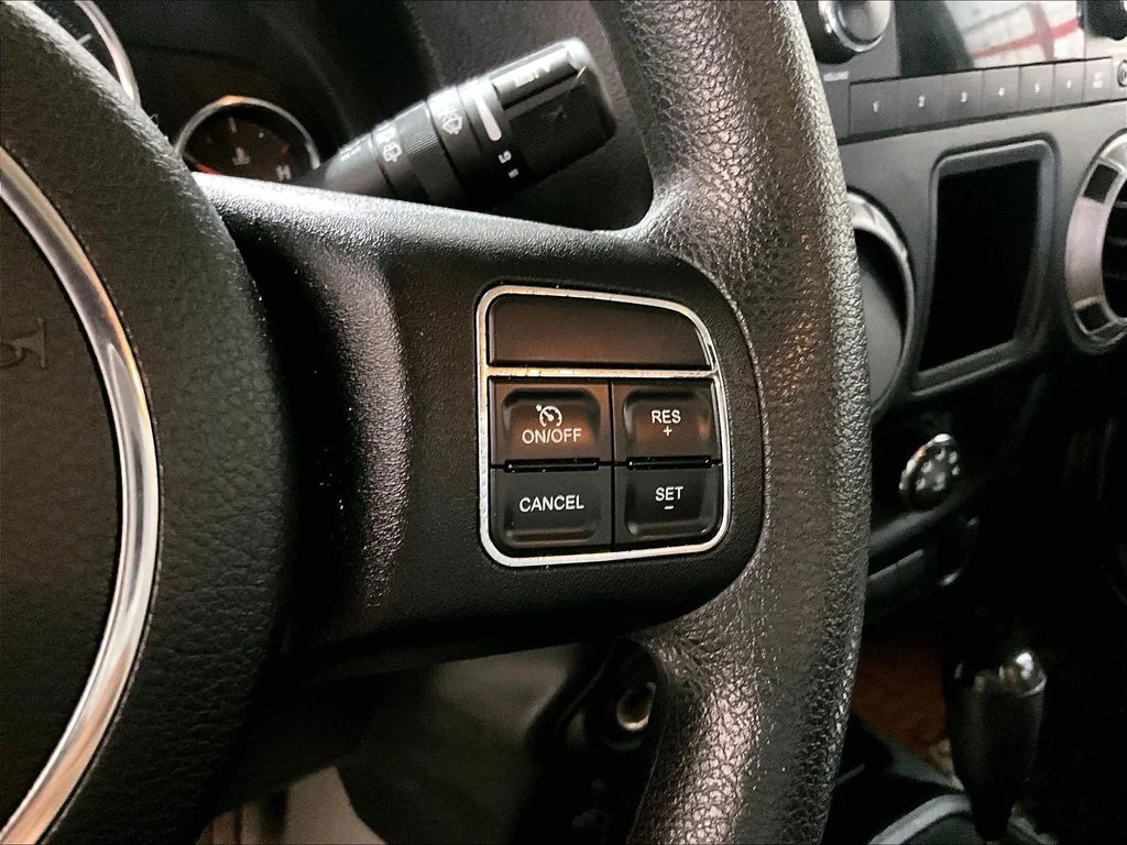 Used 2015 Silver Jeep Unlimited Sport image 18