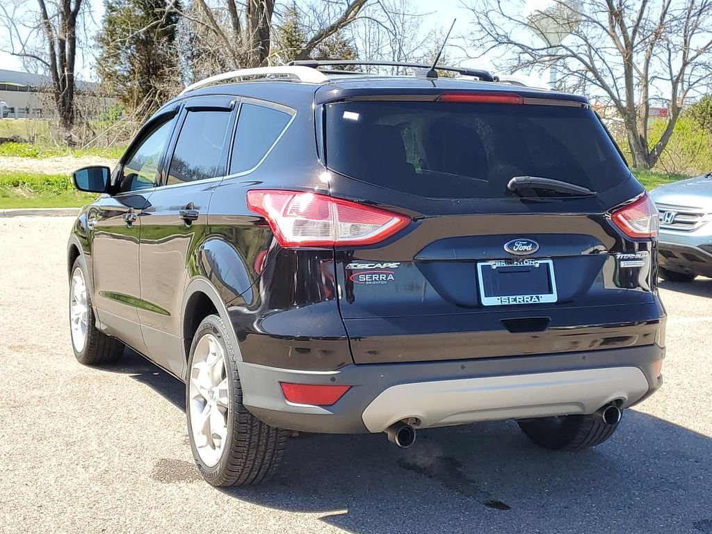 Used 2013 Ford Escape Titanium with VIN 1FMCU0J91DUA99310 for sale in Brighton, MI