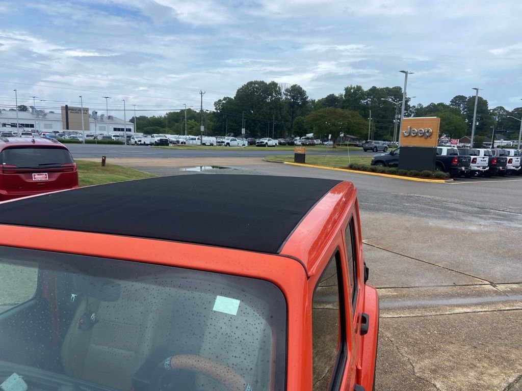 Used 2019 Orange Jeep Unlimited Sahara image 28