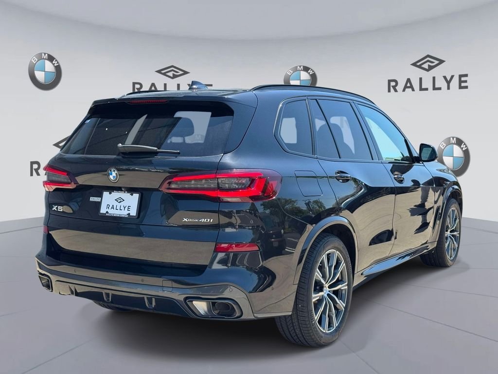 Certified Used 2023 Black Sapphire Metallic BMW xDrive40i image 4
