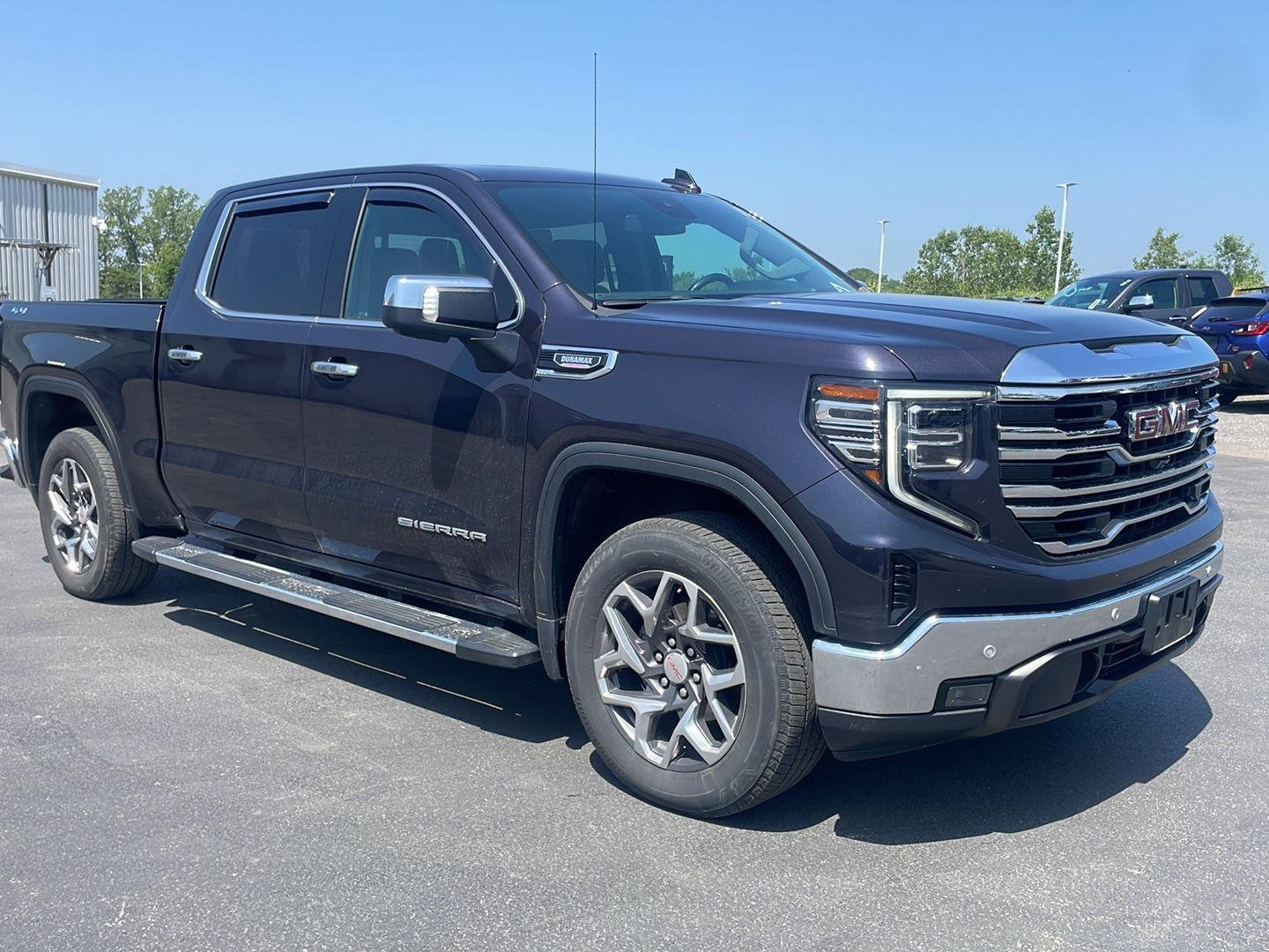 Used 2024 Titanium Rush Metallic GMC SLT image 7