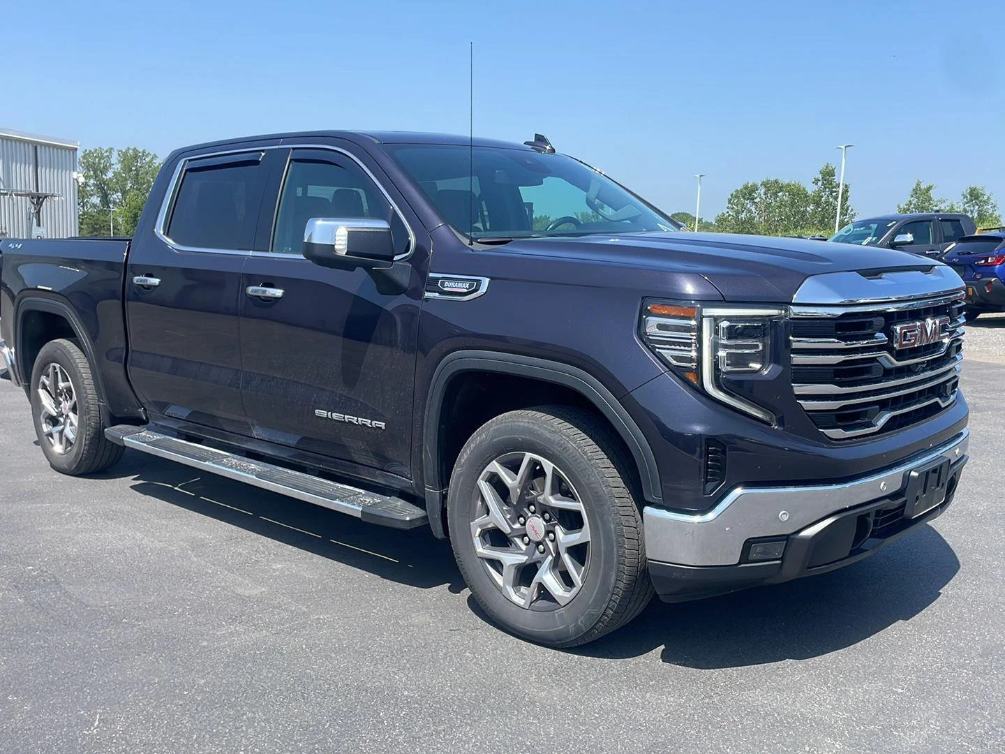 Used 2024 Titanium Rush Metallic GMC SLT image 7