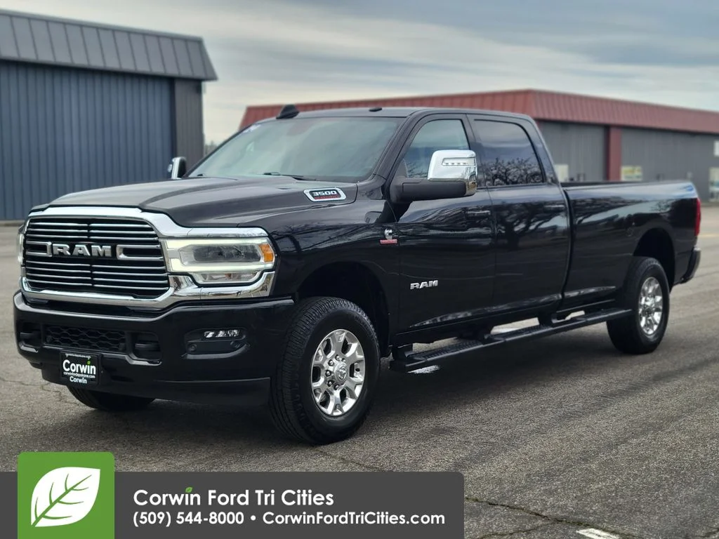 Used 2024 Diamond Black Ram Laramie image 5
