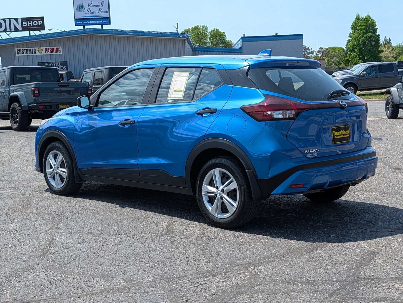 Used 2024 Electric Blue Metallic Nissan S image 5