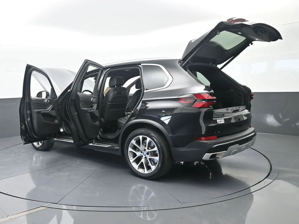 Used 2025 Black Sapphire Metallic BMW xDrive50e image 81