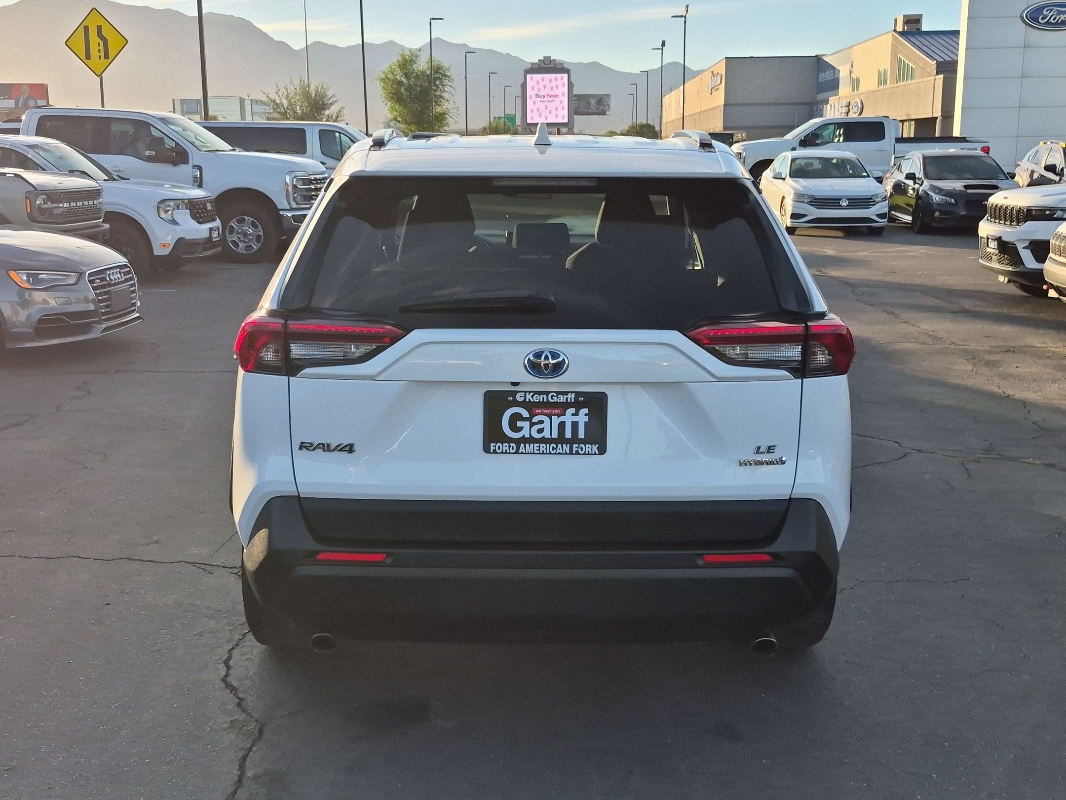 Used 2019 Super White Toyota Hybrid LE image 4