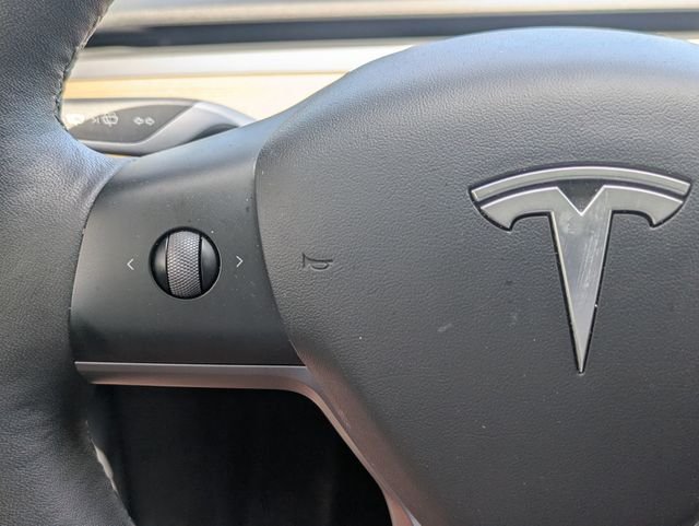 Used 2023 Solid Black Tesla Performance image 17