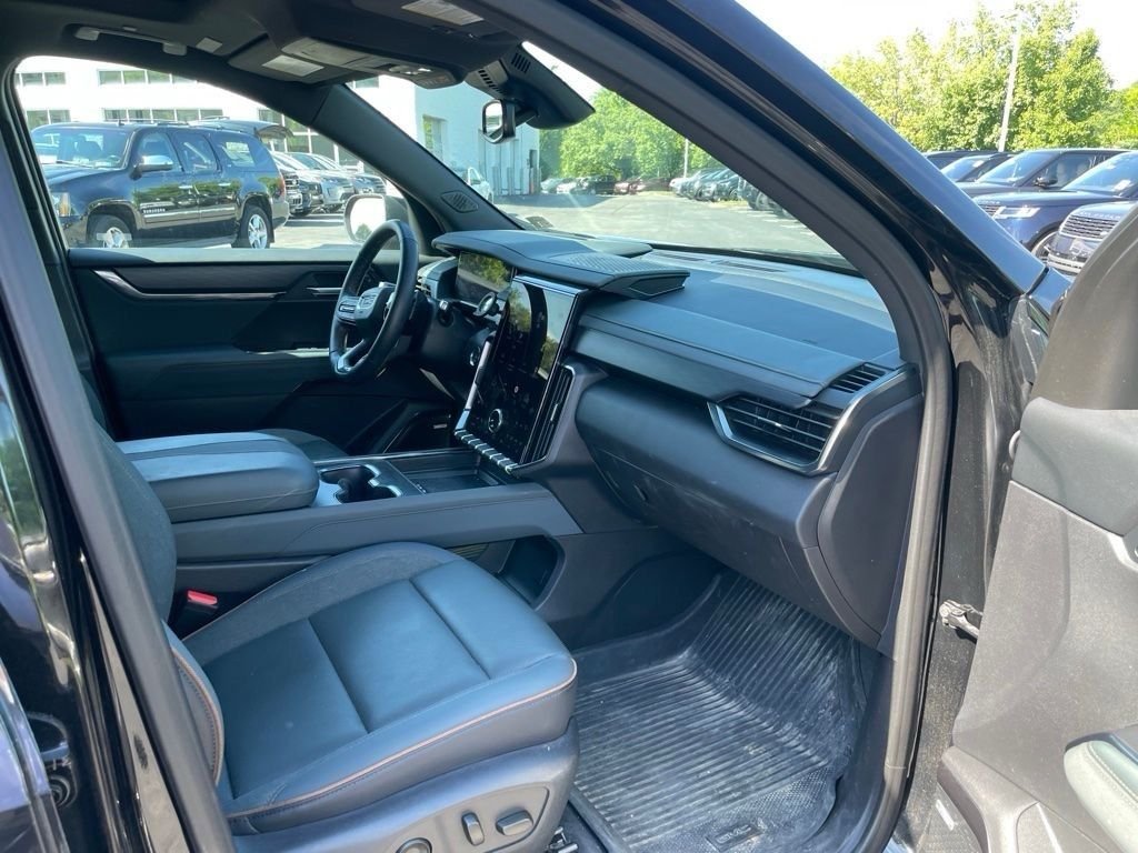 Used 2024 Ebony Twilight Metallic GMC AT4 image 11