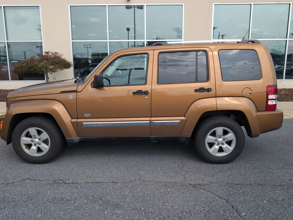 Used 2011 Brown Jeep Sport image 8