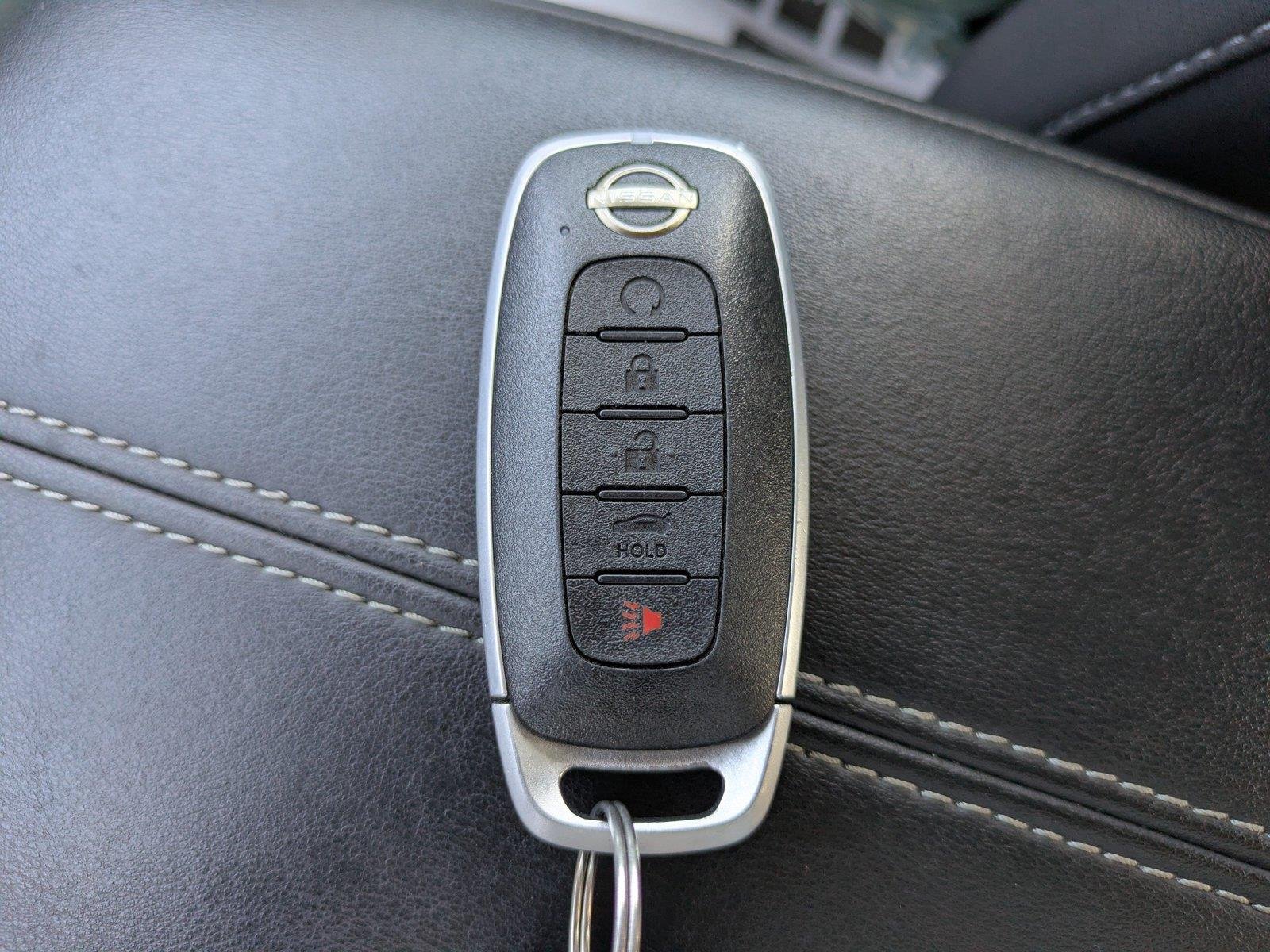 Used 2024 Rosewood Metallic Nissan SV image 27