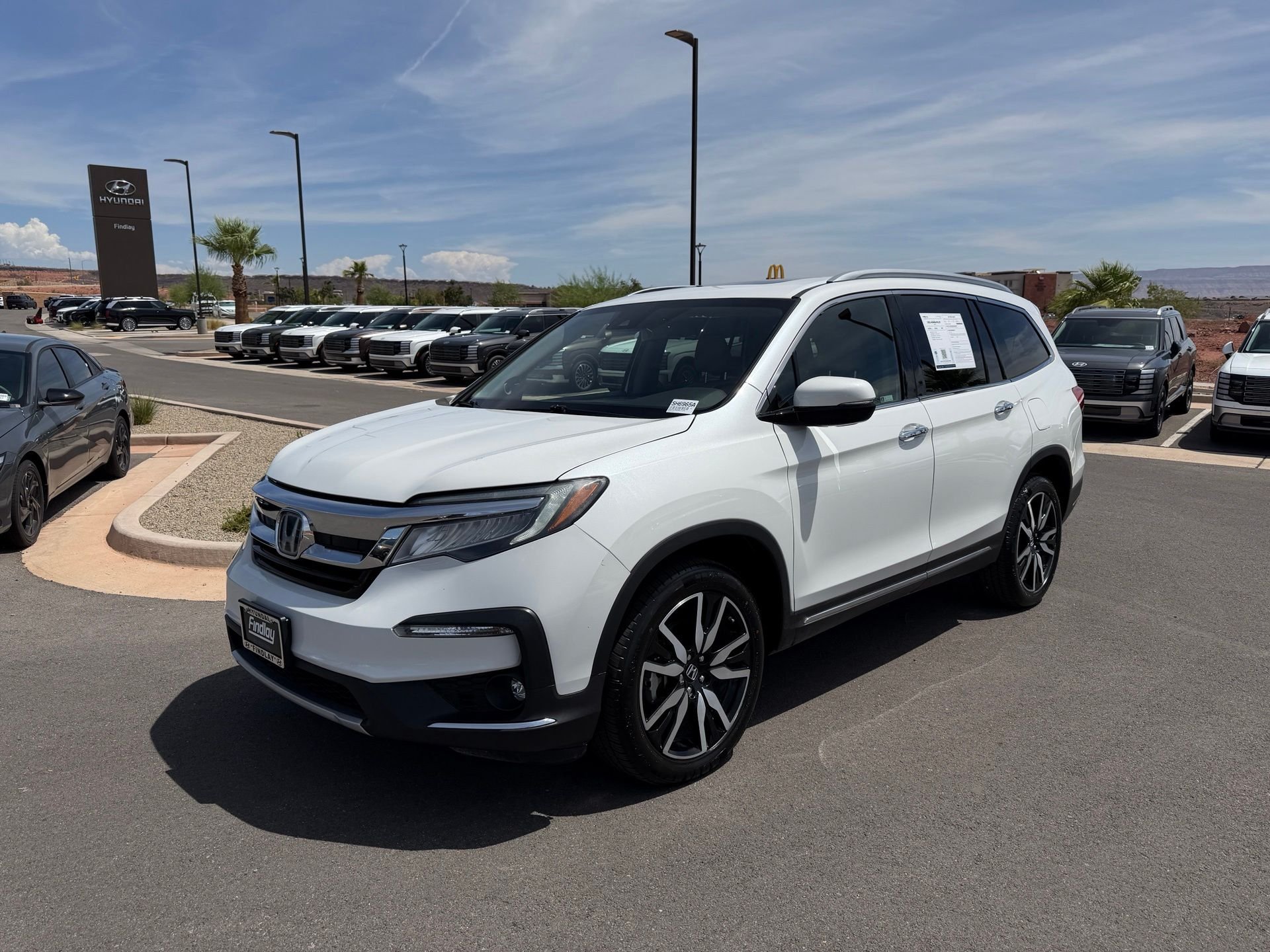2021 Honda Pilot Touring AWD with Rear Captains Chairs