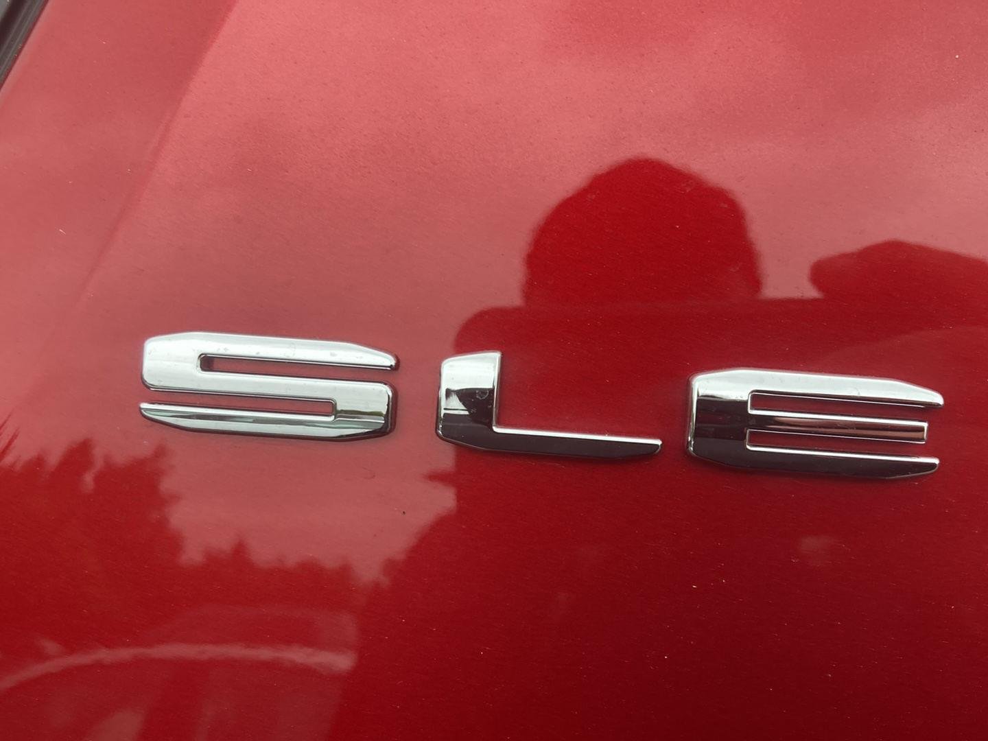 Used 2023 Volcanic Red Tintcoat GMC SLE image 10