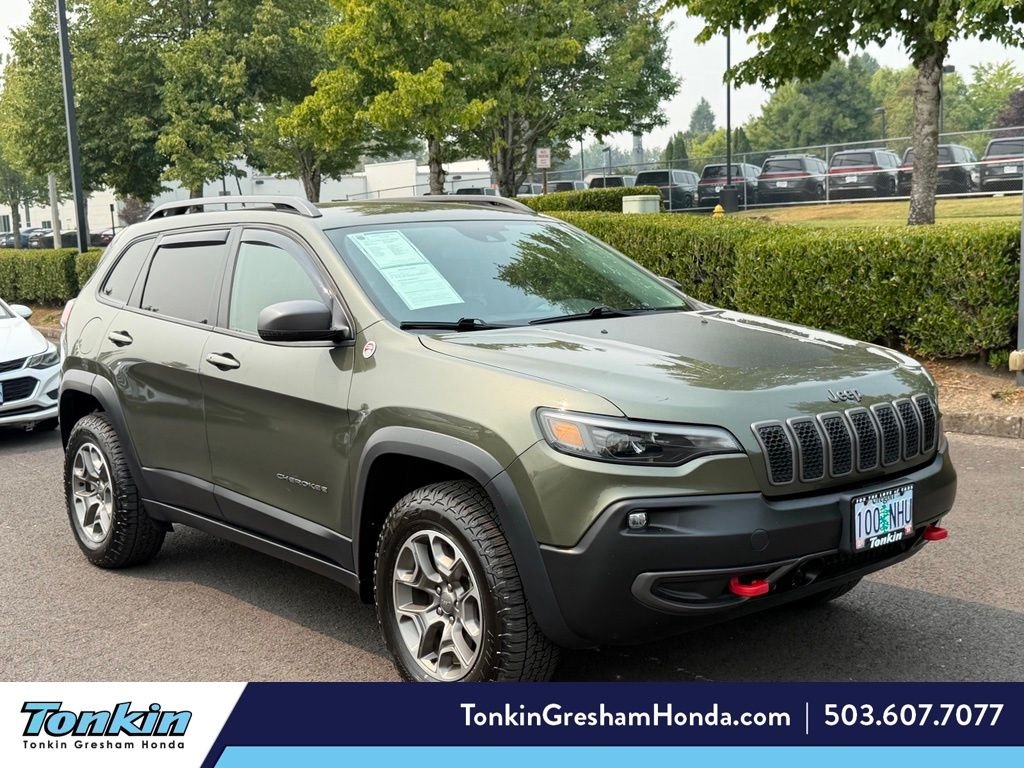 Used 2021 Olive Green Pearlcoat Jeep Trailhawk image 1