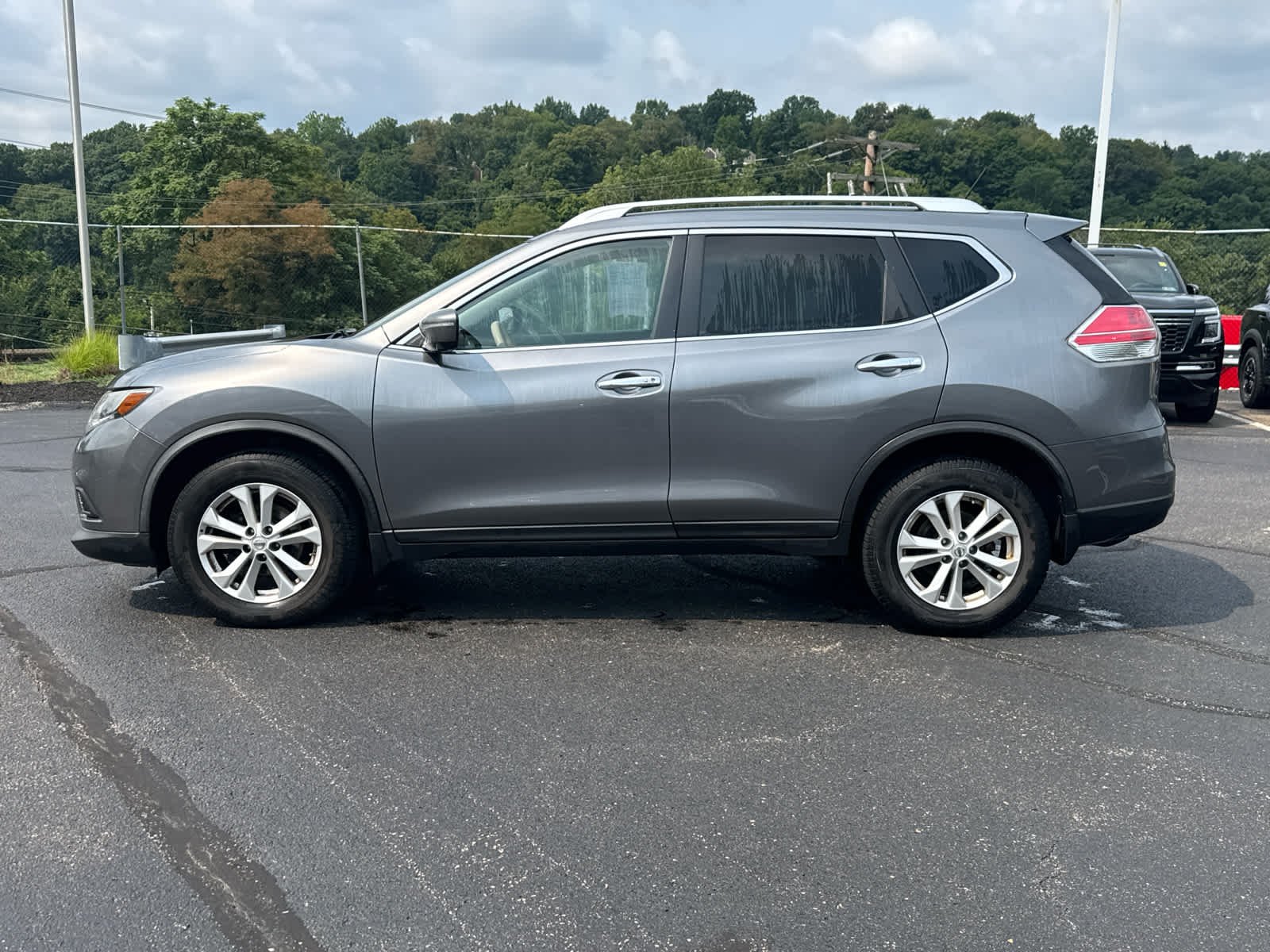 Used 2015 Gun Metallic Nissan SV image 3