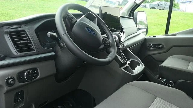 New 2026 Oxford White Ford Passenger Van XLT image 2