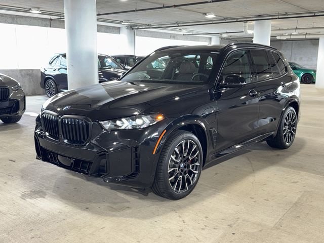 New 2026 Black Sapphire Metallic BMW xDrive50e image 3