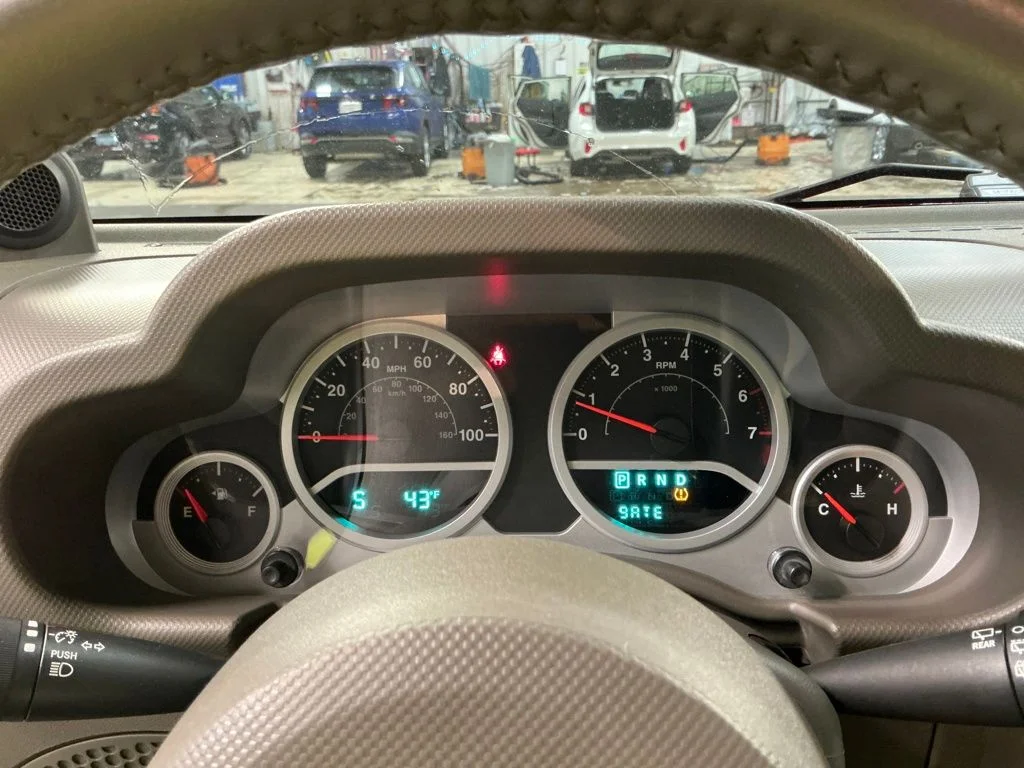 Used 2010 Red Jeep Unlimited Sahara image 19