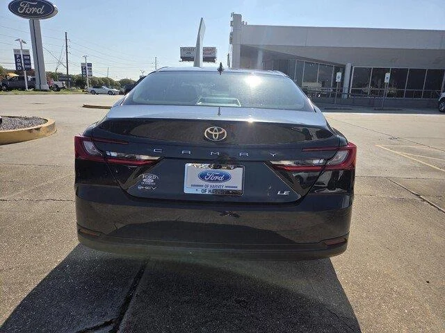 Used 2025 Midnight Black Metallic Toyota LE image 4