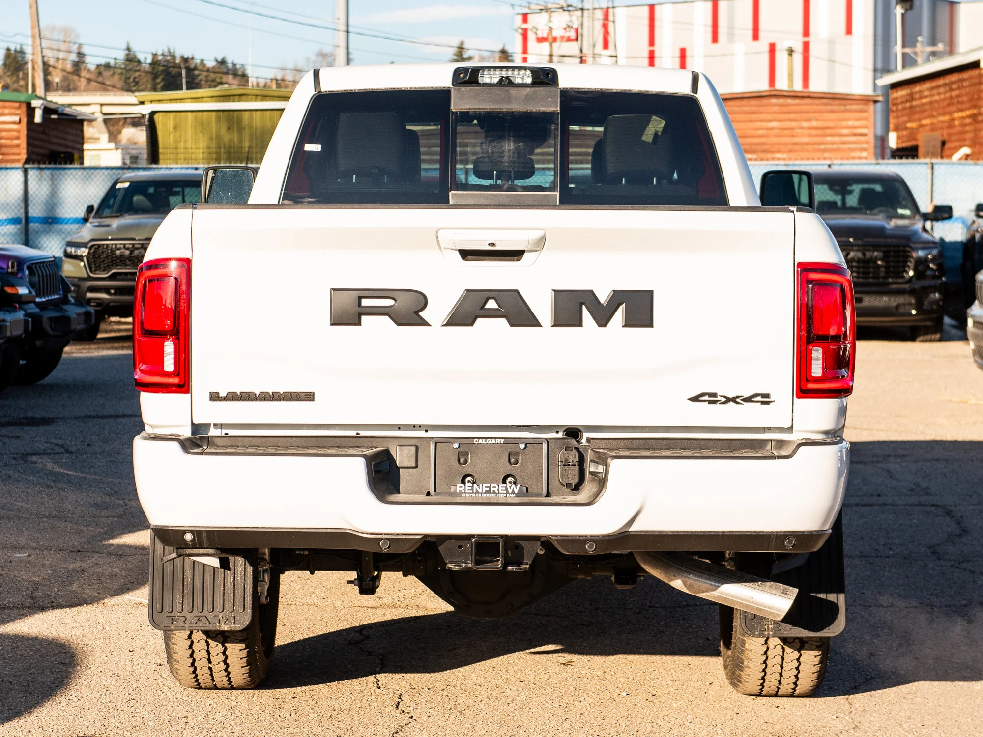 New 2026 White RAM Laramie* image 4