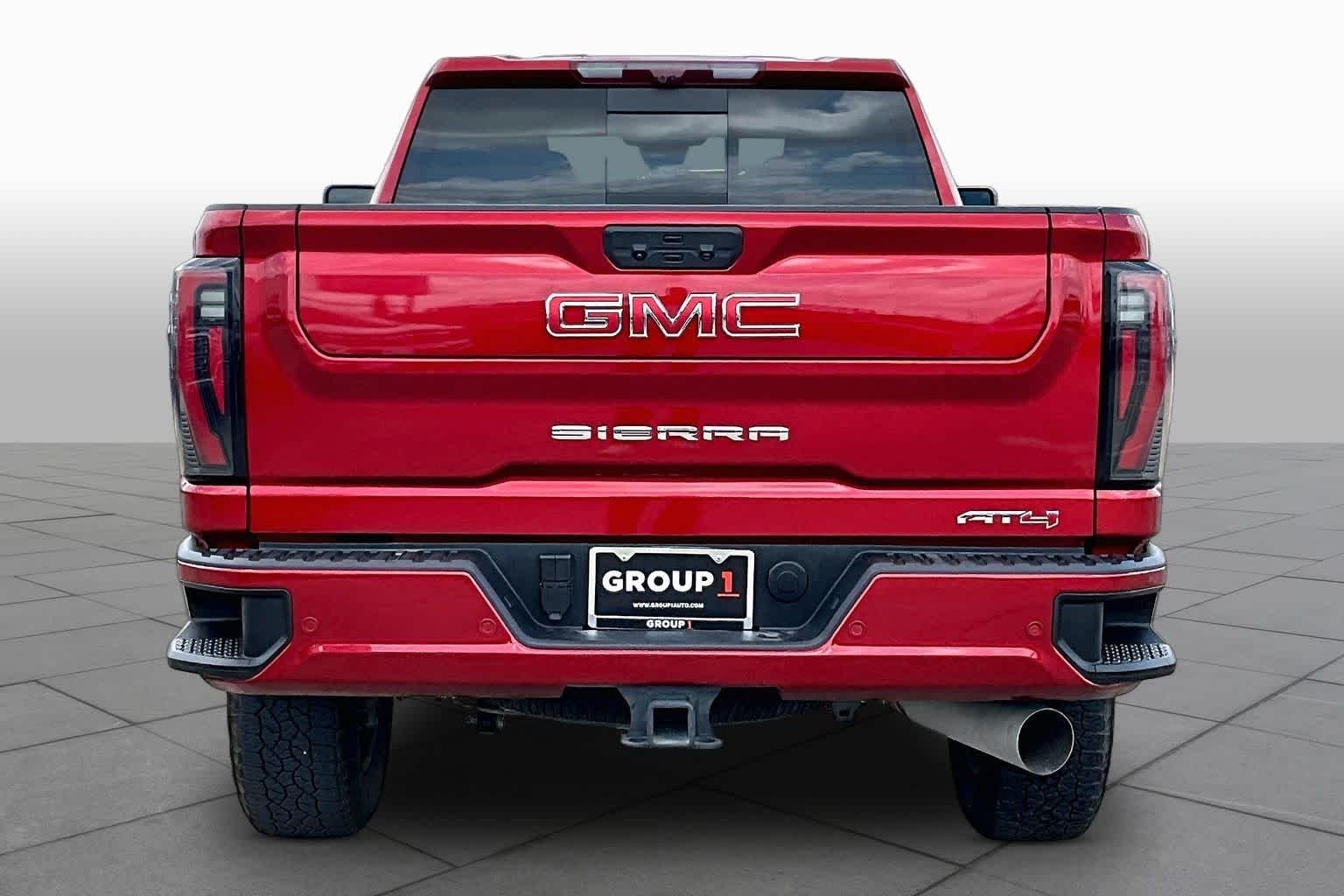 Used 2025 Volcanic Red Tintcoat GMC AT4 image 5