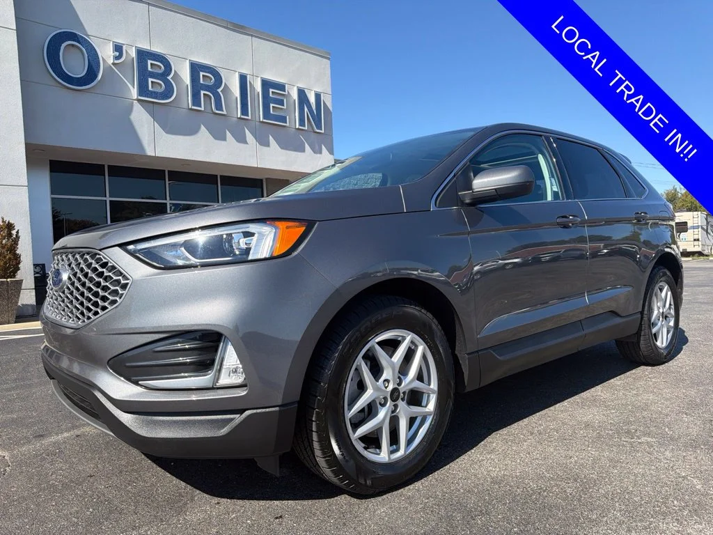 Used 2024 Carbonized Gray Metallic Ford SEL image 1