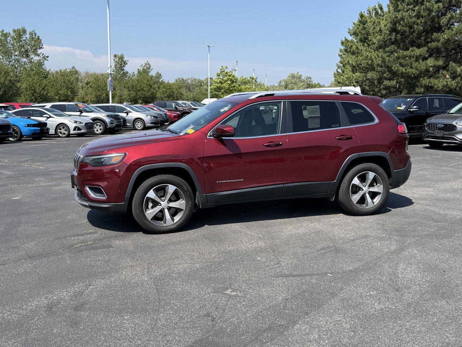 Used 2021 Velvet Red Pearlcoat Jeep Limited image 4