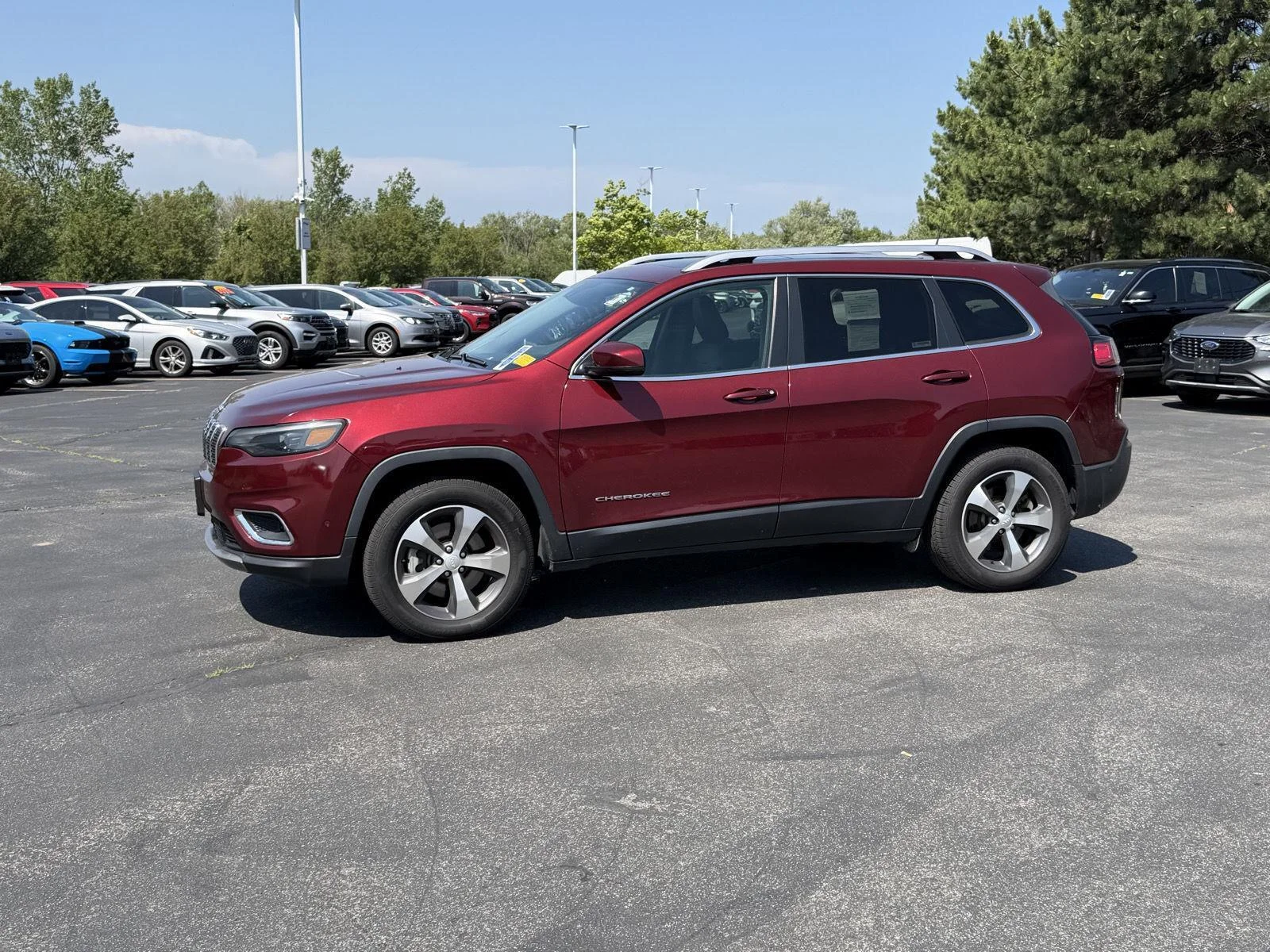 Used 2021 Velvet Red Pearlcoat Jeep Limited image 4