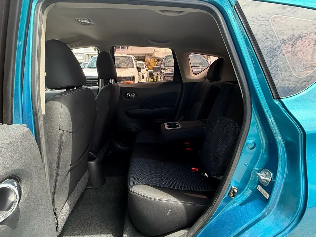 Used 2014 Metallic Peacock Nissan SV image 11