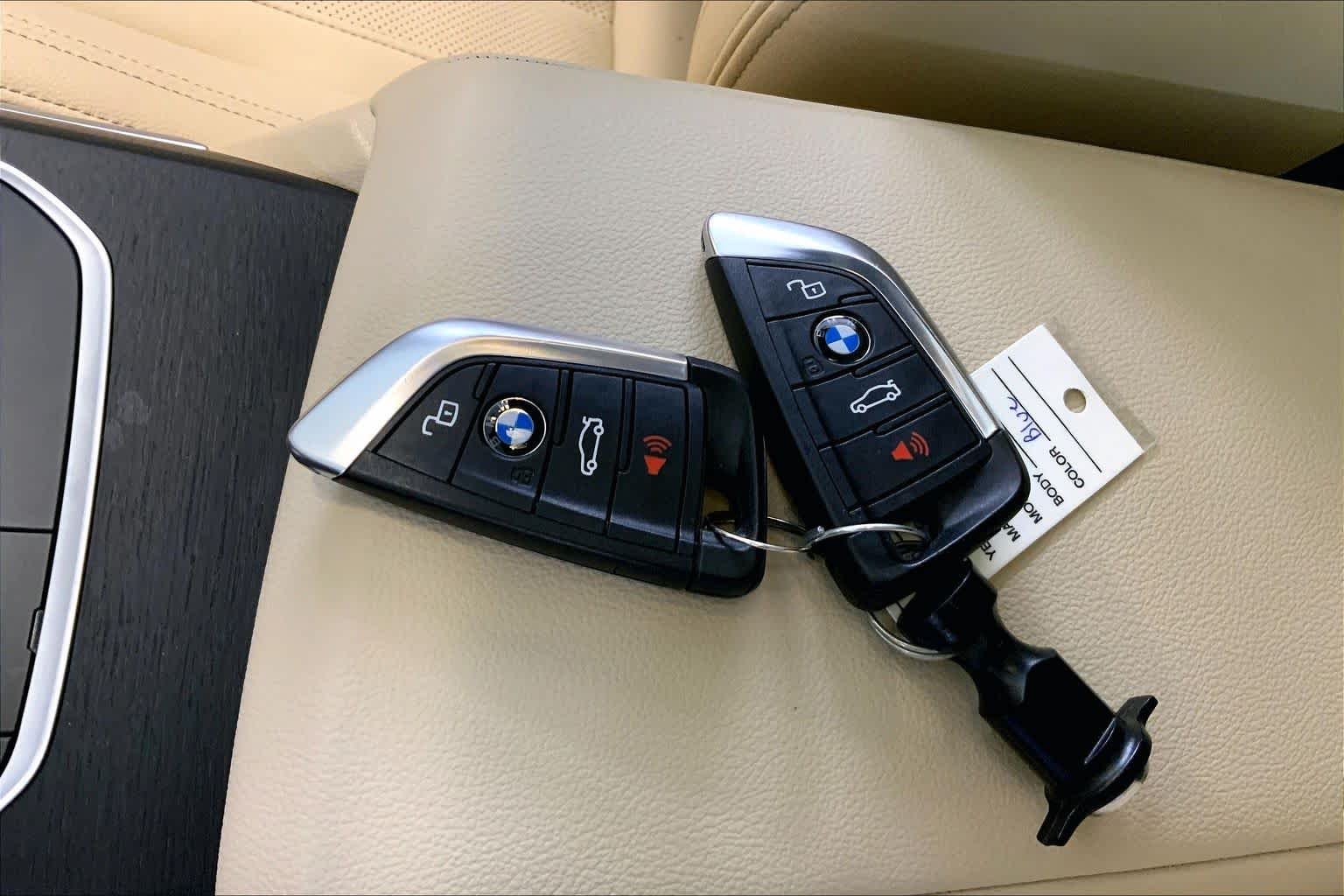 Used 2024 Portimao Blue Metallic BMW xDrive40 image 14