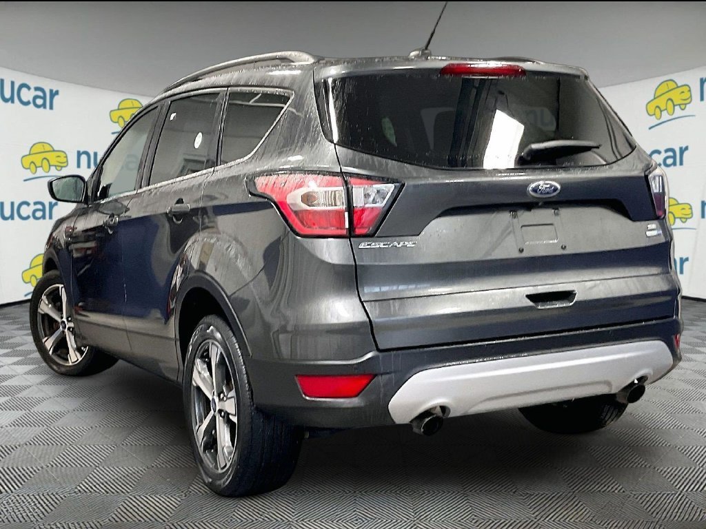 Used 2017 Gray Ford SE image 4
