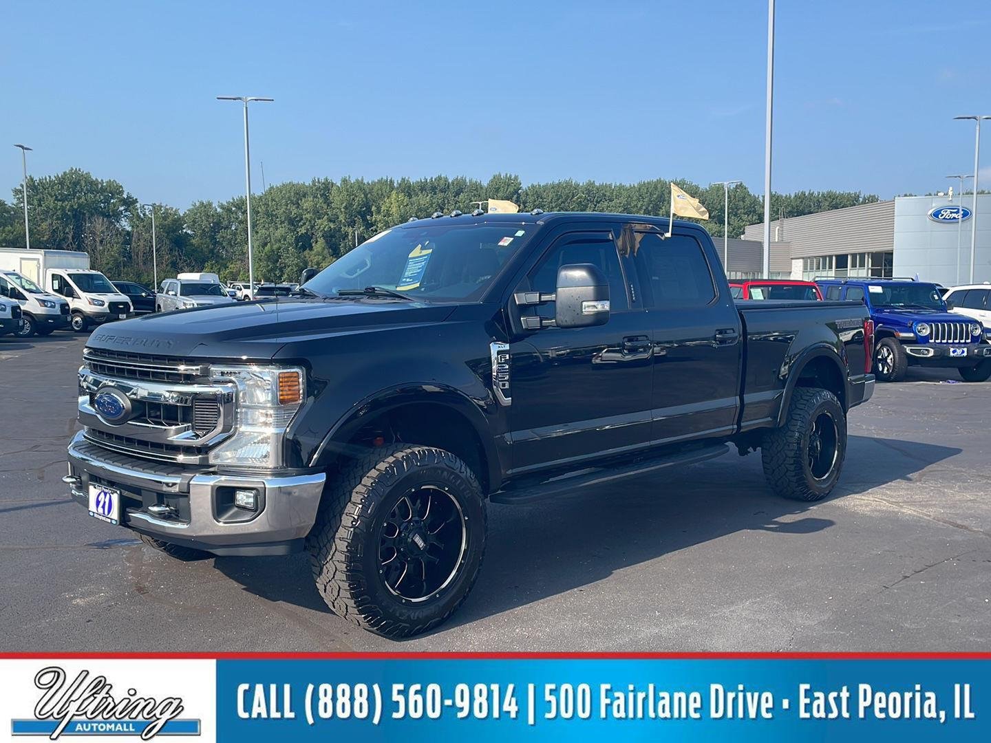Certified Used 2021 Agate Black Metallic Ford XLT image 1