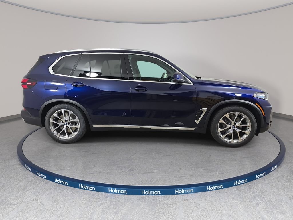 New 2026 Tanzanite Blue II Metallic BMW xDrive50e image 4