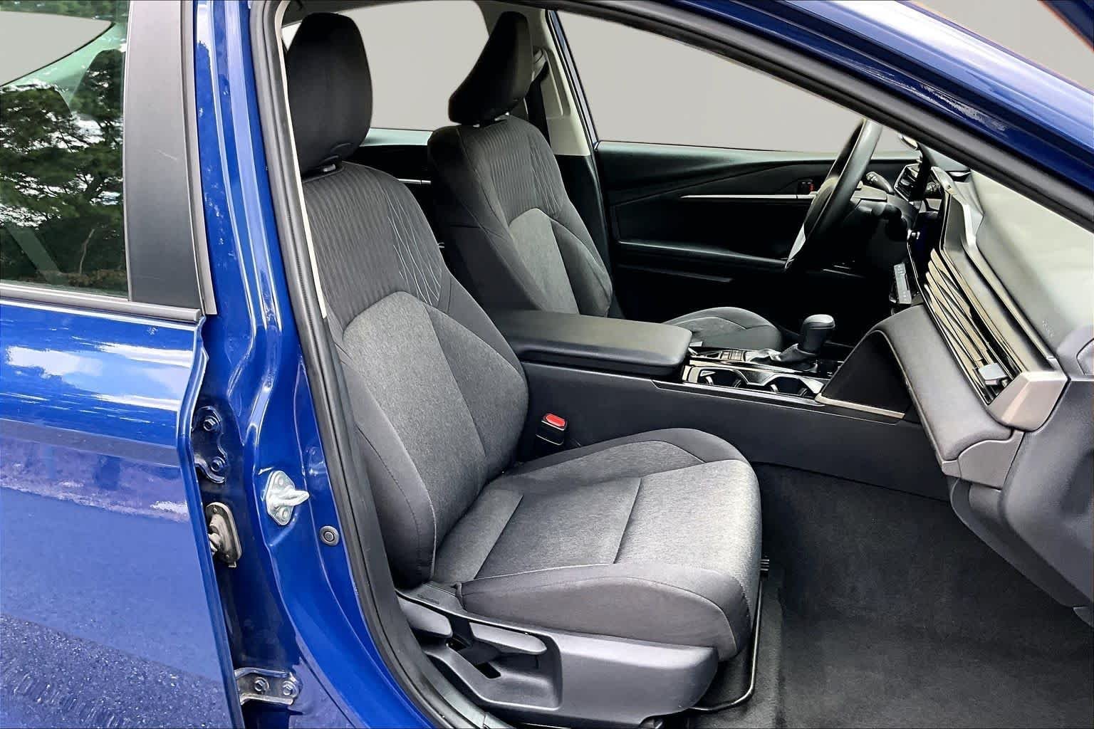 Used 2025 Reservoir Blue Toyota LE image 9