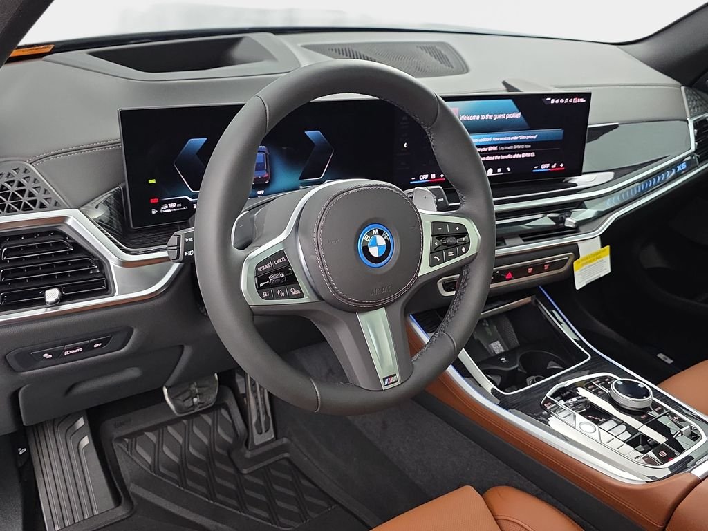 New 2026 Black Sapphire Metallic BMW xDrive50e image 16