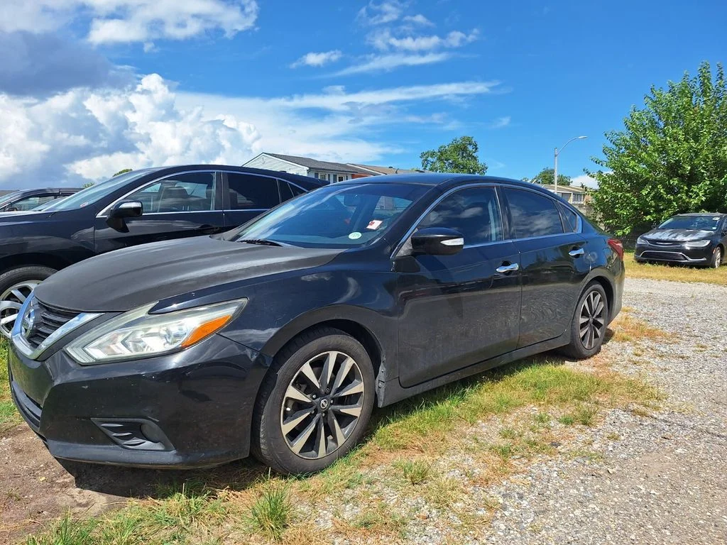 Used 2018 Super Black Nissan 2.5 SL image 1