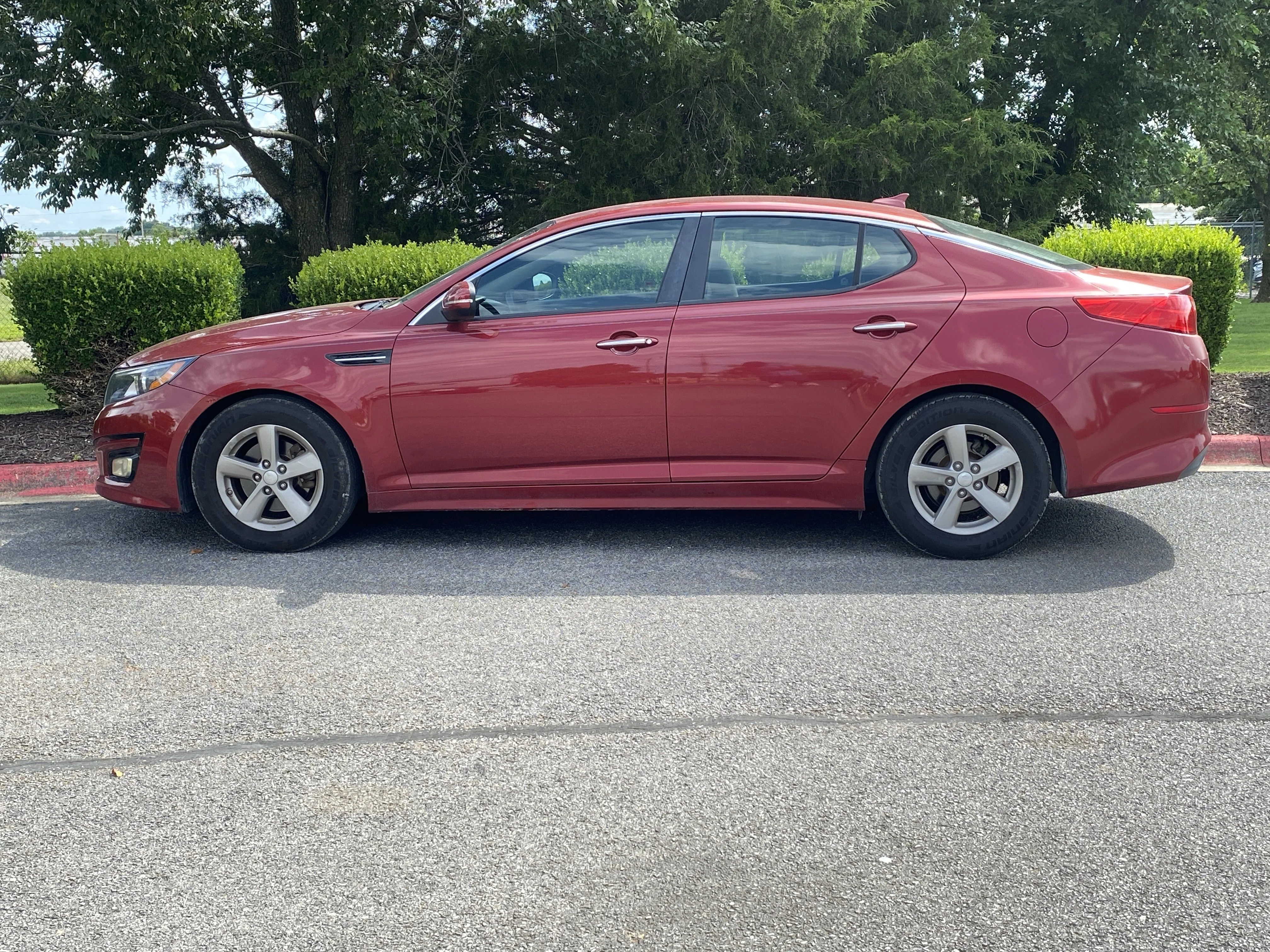 Used 2014 Remington Red Metallic Kia LX image 7