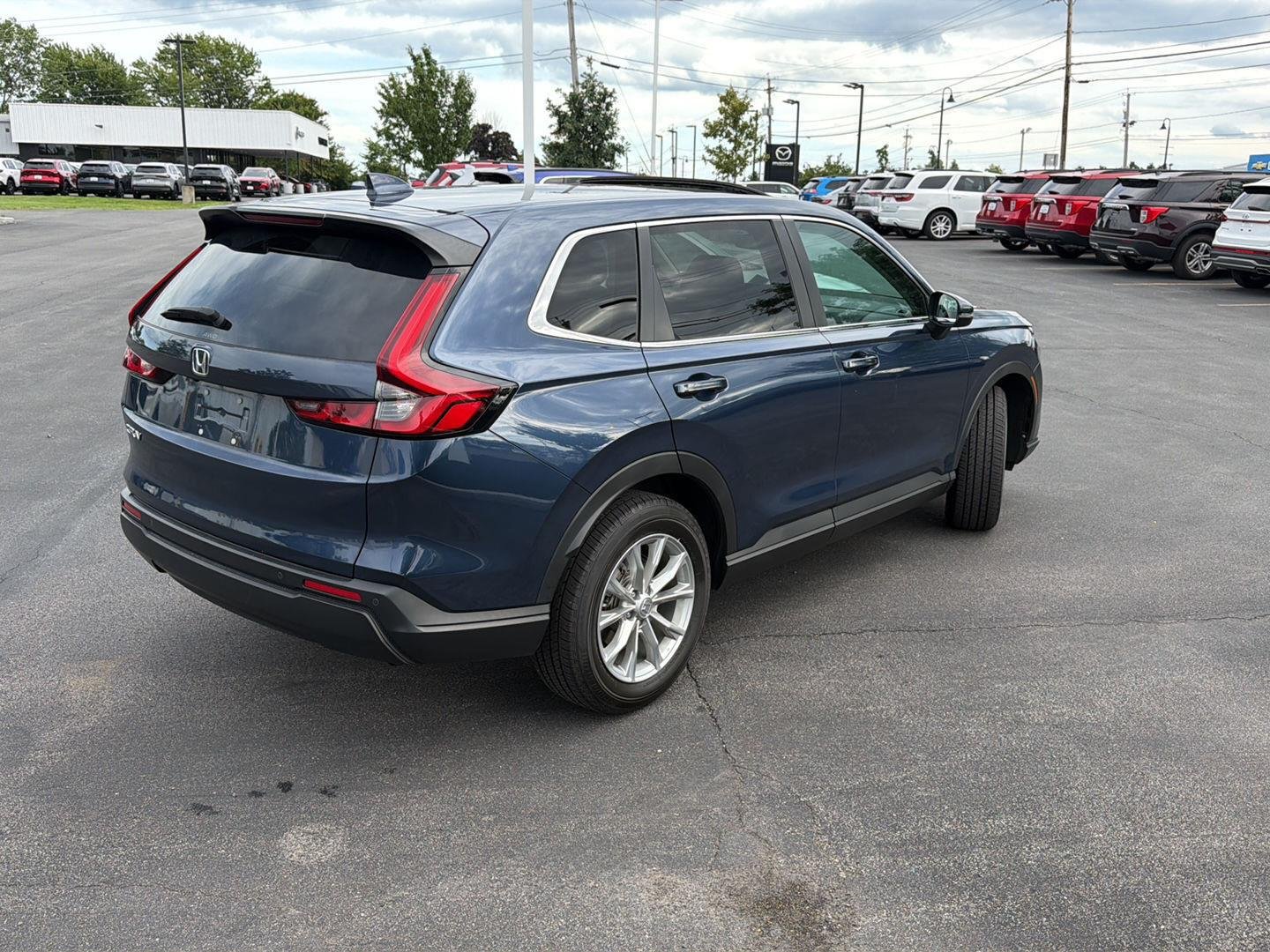 Used 2024 Canyon River Blue Metallic Honda EX-L image 7
