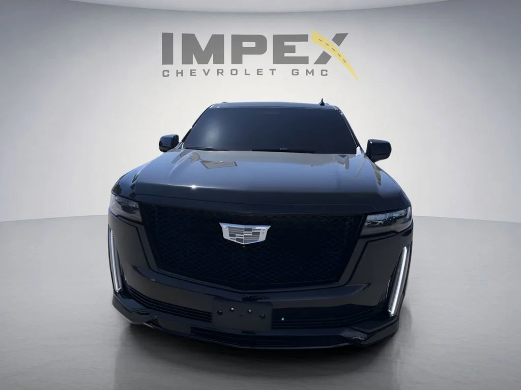 Used 2023 Black Raven Cadillac Sport image 1