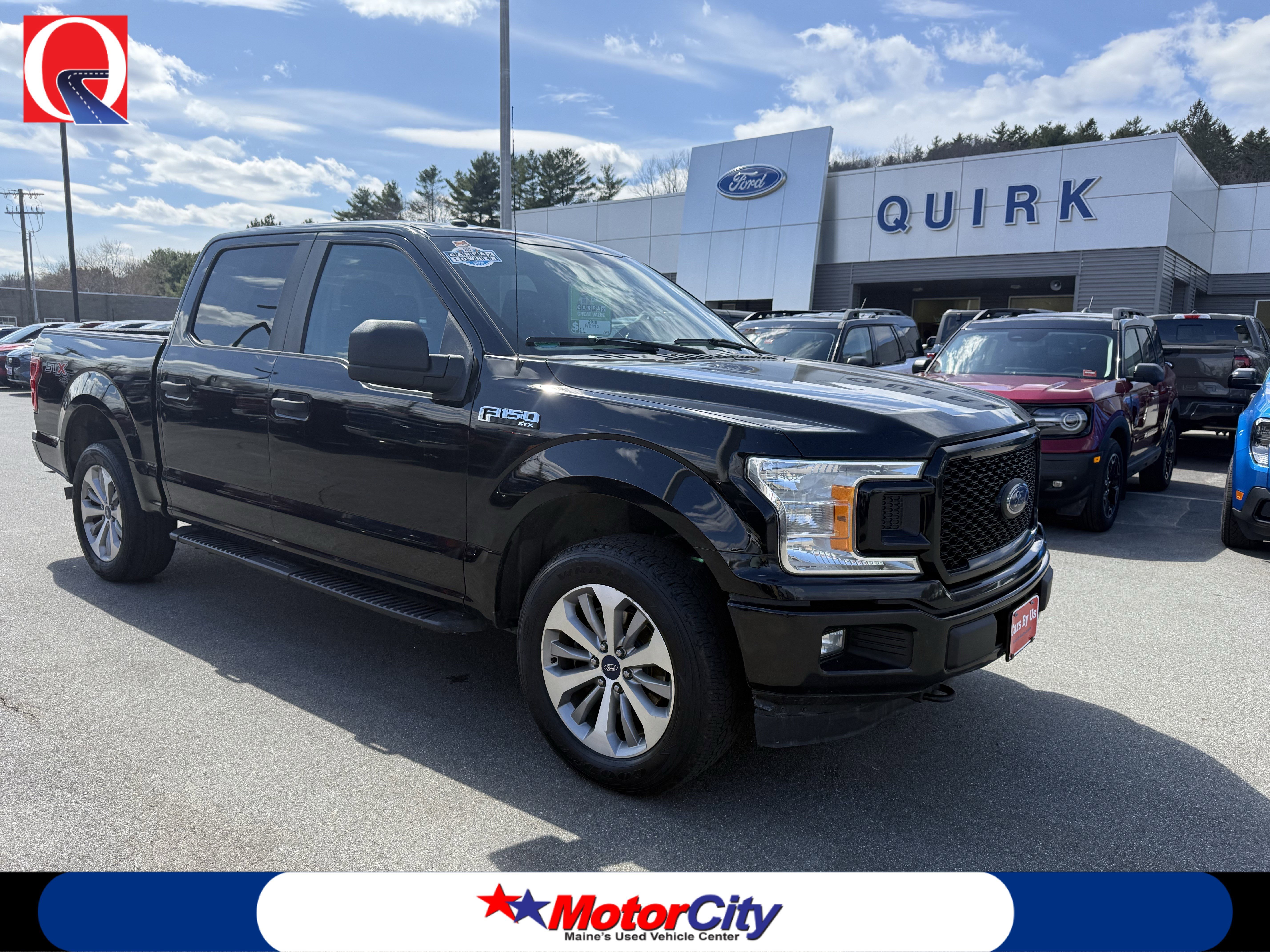 Used 2018 SHADOW BLACK Ford XL image 1