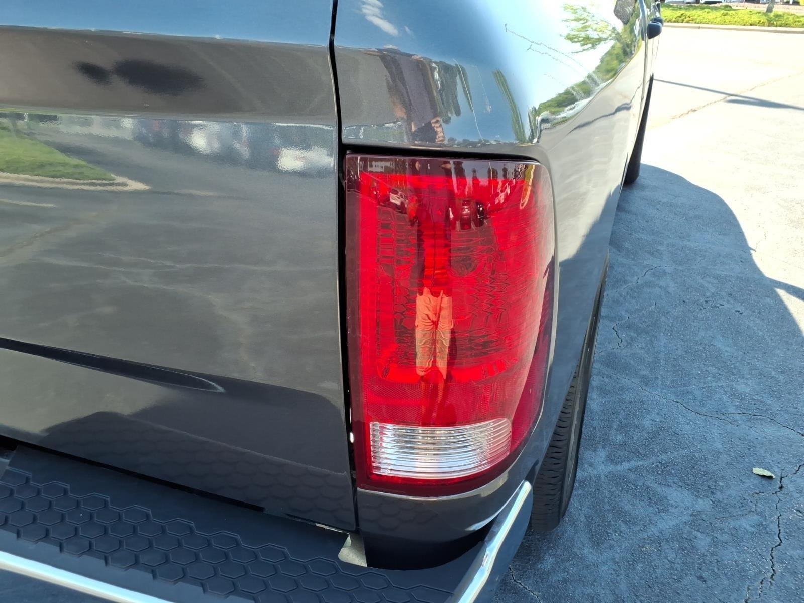 Used 2024 Granite Crystal Metallic Clearcoat Ram SLT image 16