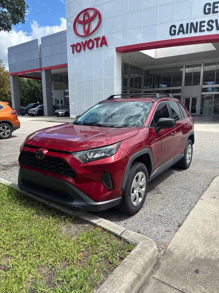 Certified Used 2021 Red Toyota LE image 1