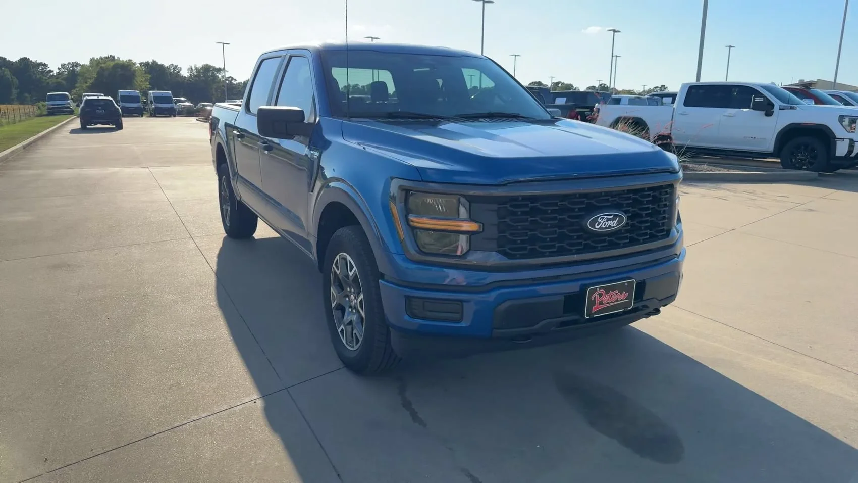 Used 2025 Blue Metallic Ford STX image 2