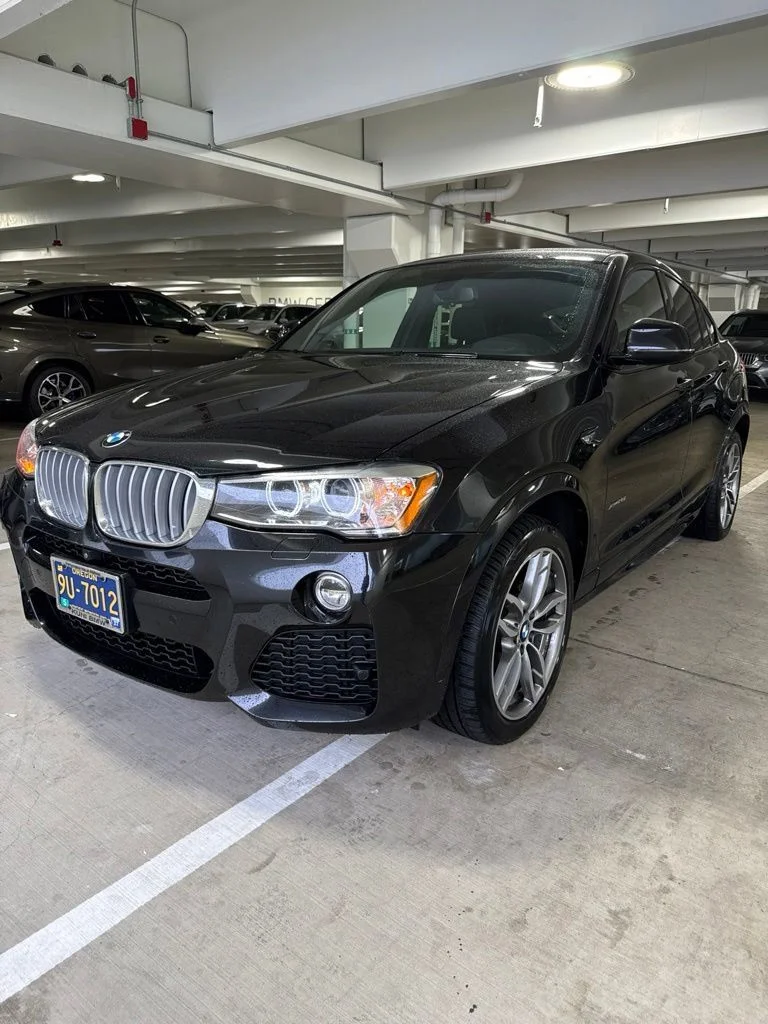 Used 2017 Black Sapphire Metallic BMW xDrive28i image 1
