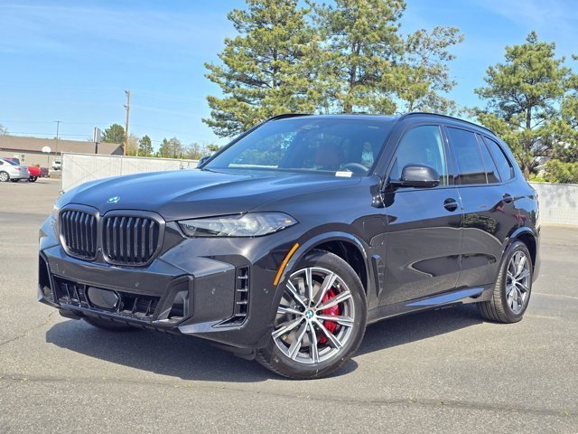 New 2026 Black Sapphire Metallic BMW xDrive50e image 33