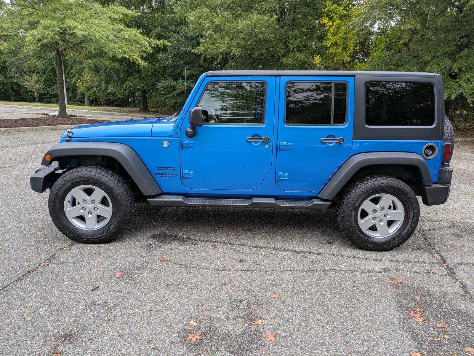 Used 2015 Hydro Blue Pearl Coat Jeep Sport image 7