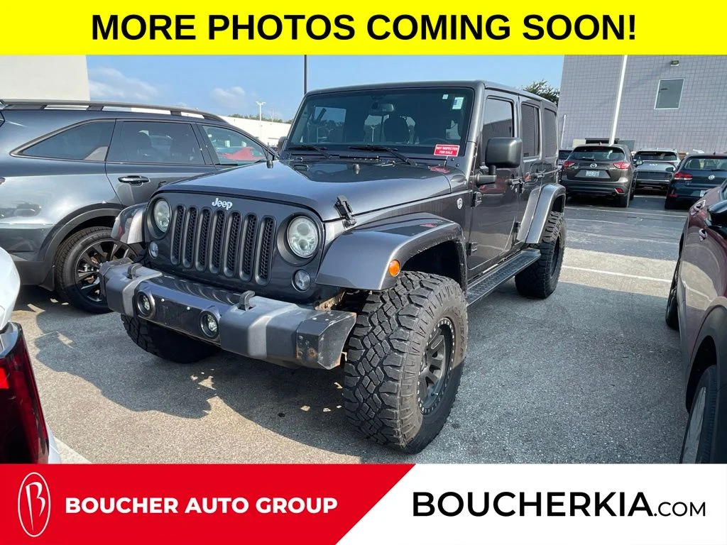 Used 2018 Granite Crystal Metallic Clearcoat Jeep Unlimited Sahara image 1