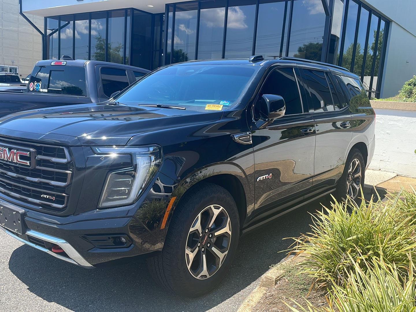 Used 2025 Onyx Black GMC AT4 Ultimate image 1