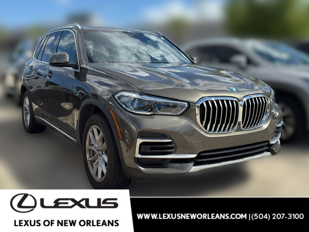 Used 2023 Manhattan Green Metallic BMW xDrive45e image 1