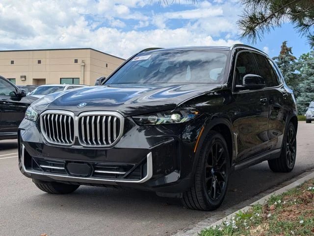 Used 2025 Black Sapphire Metallic BMW xDrive50e image 5